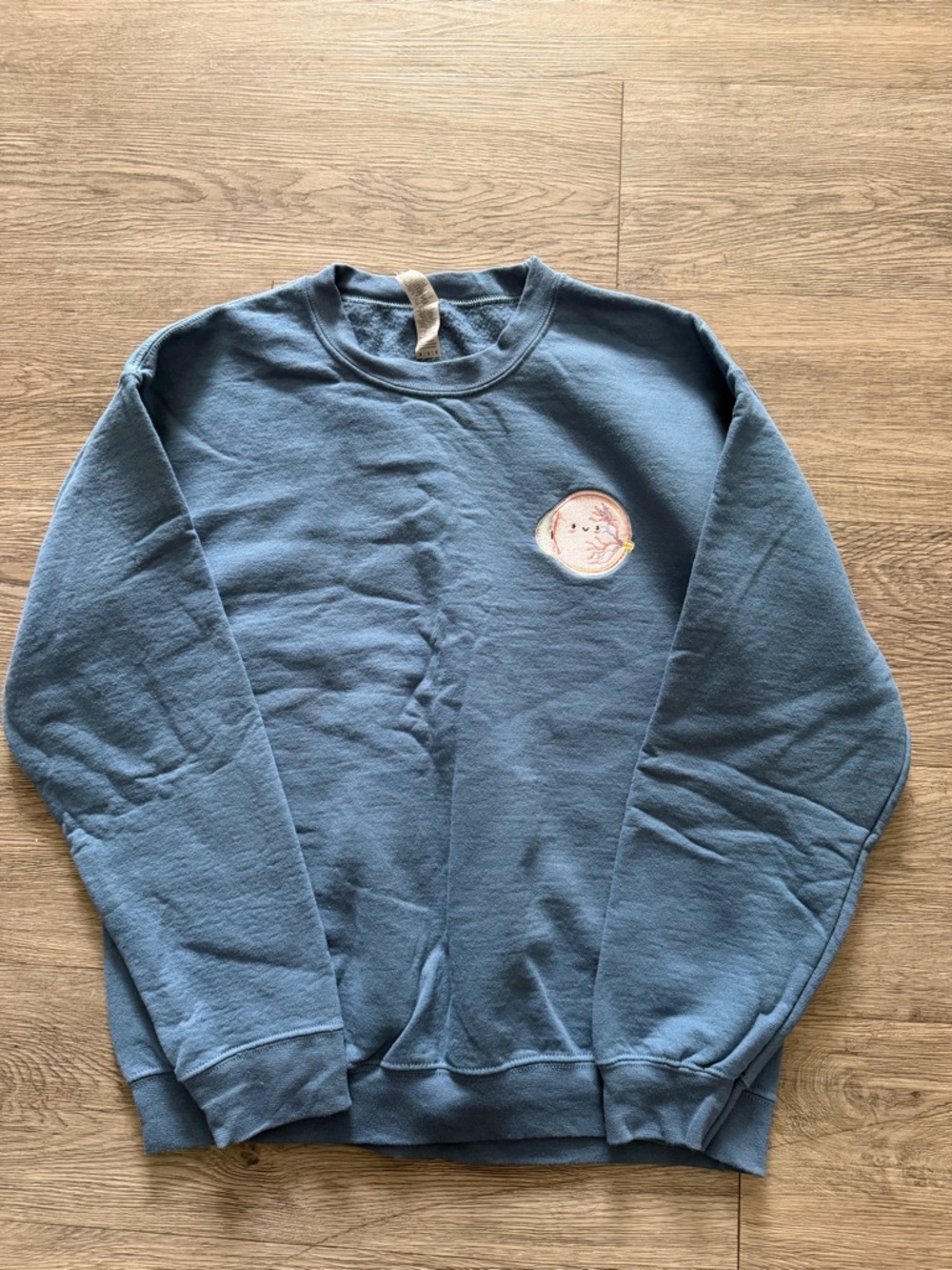 Men's Blue Crewneck Sweatshirt with Small Embroidered Patch